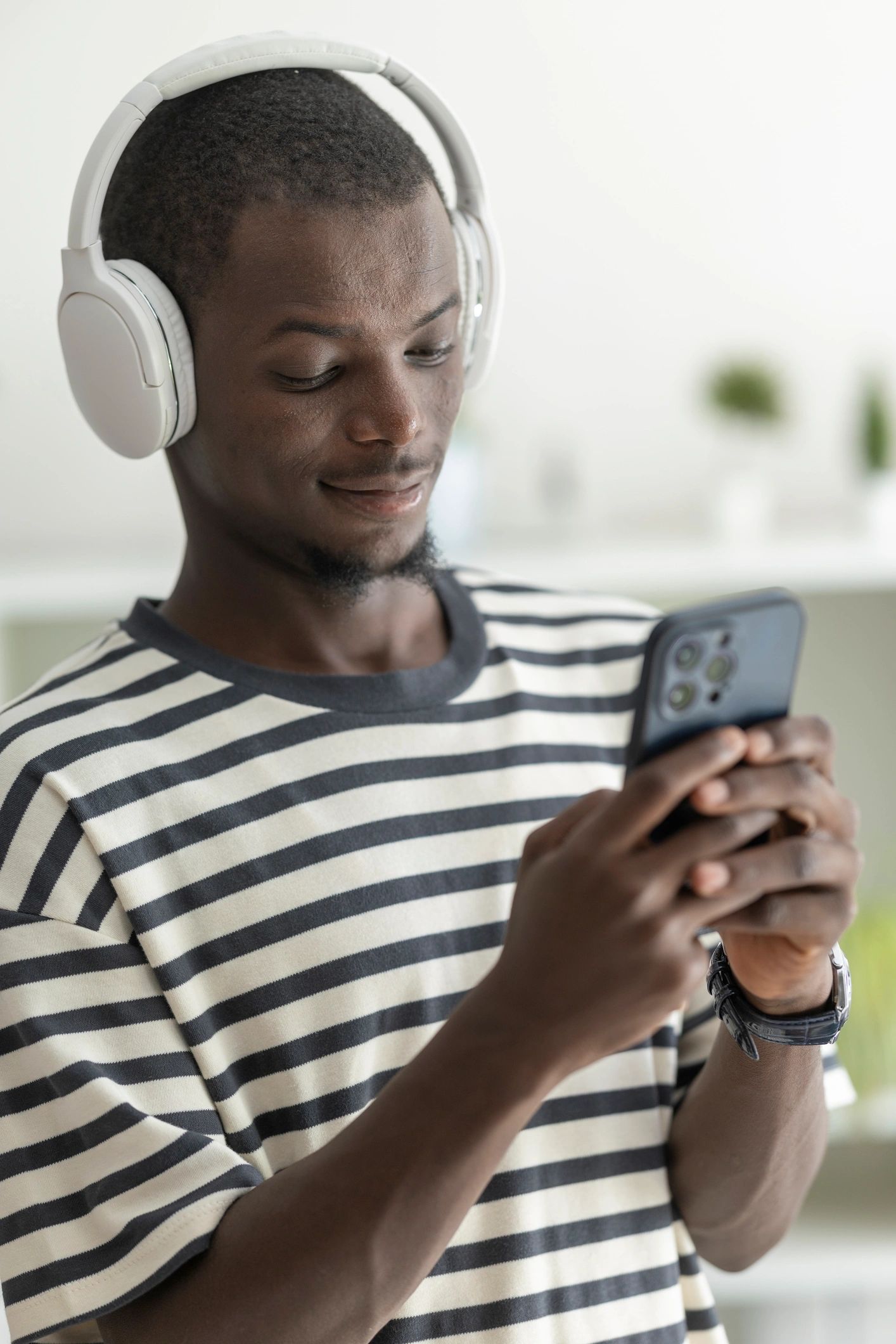 Person using a smartphone for streaming content